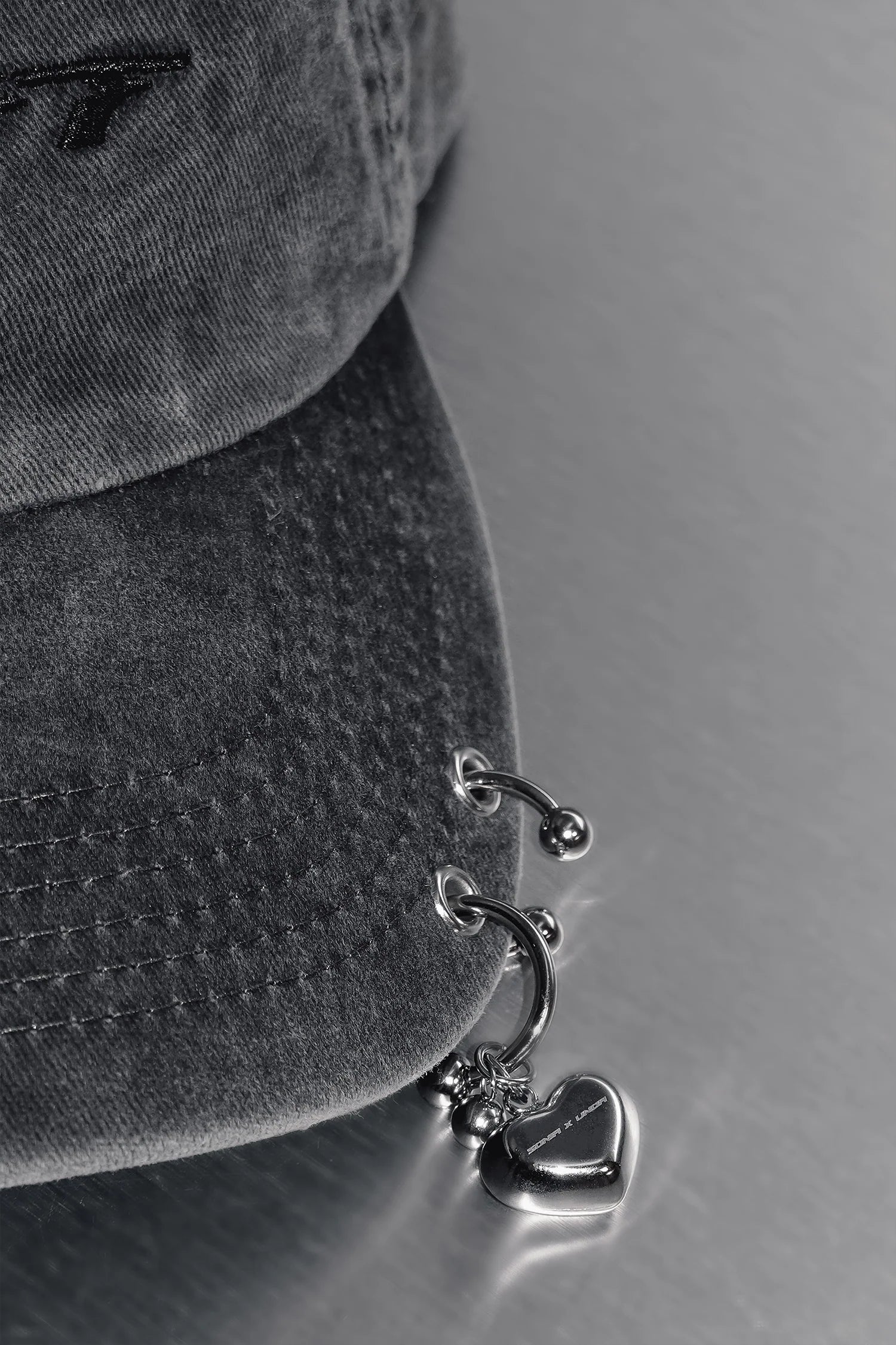 Split Charm Cap